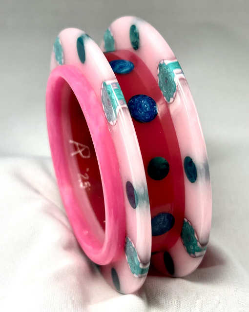 AP4 pinks and blues Saturn bakelite bangle