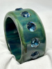 AB228 Dombek? wide blue moon bakelite bangle